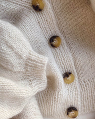 Detaljebillede af hvid Balloncardigan 