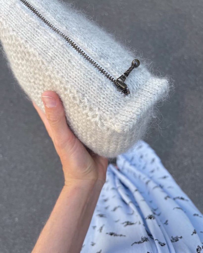 Lys honey clutch med perlemor lynlås