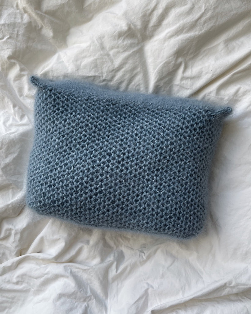 Blå honey clutch liggende