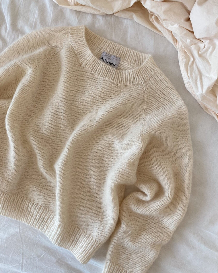 Detaljebillede af hvidnistret Ingen Dikkedarer Sweater 
