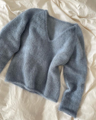 Liggende lyseblåe Kumulus Bluse 