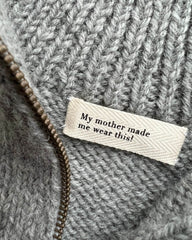 "My mother made me wear this!" label